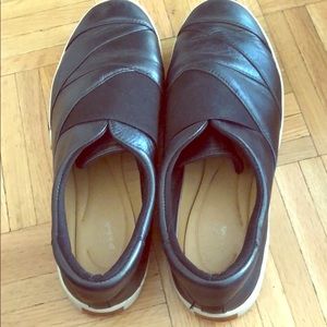Black leather slip on sneakers